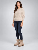 Women's Lug-Sole Ankle Boots – Fur Trim in Beige — on model