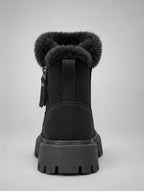Women's Lug-Sole Ankle Boots – Fur Trim in Black — back view