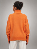 Women's Oversized Turtleneck Sweater – Relaxed Knit in Orange — back view