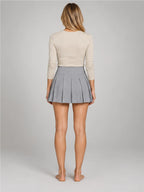 Women's Pleated Mini Skirt – Wool-Blend with Built-In Shorts in Light Grey — back view