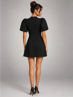 Women's Puff-Sleeve Mini Dress – Flared Skater Fit in Black — back view