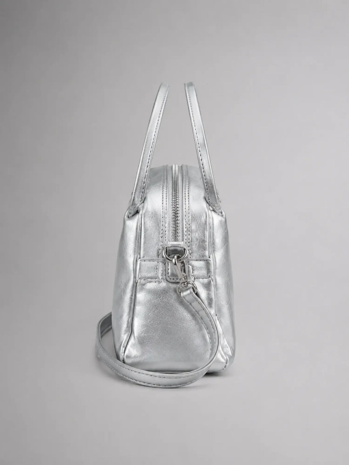 Women's Mini Double-Zip Crossbody Bag – Compact Everyday Style in silver, side view