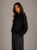 Women's Suede-Look Bomber Jacket – Oversized Collared in Black – Side view