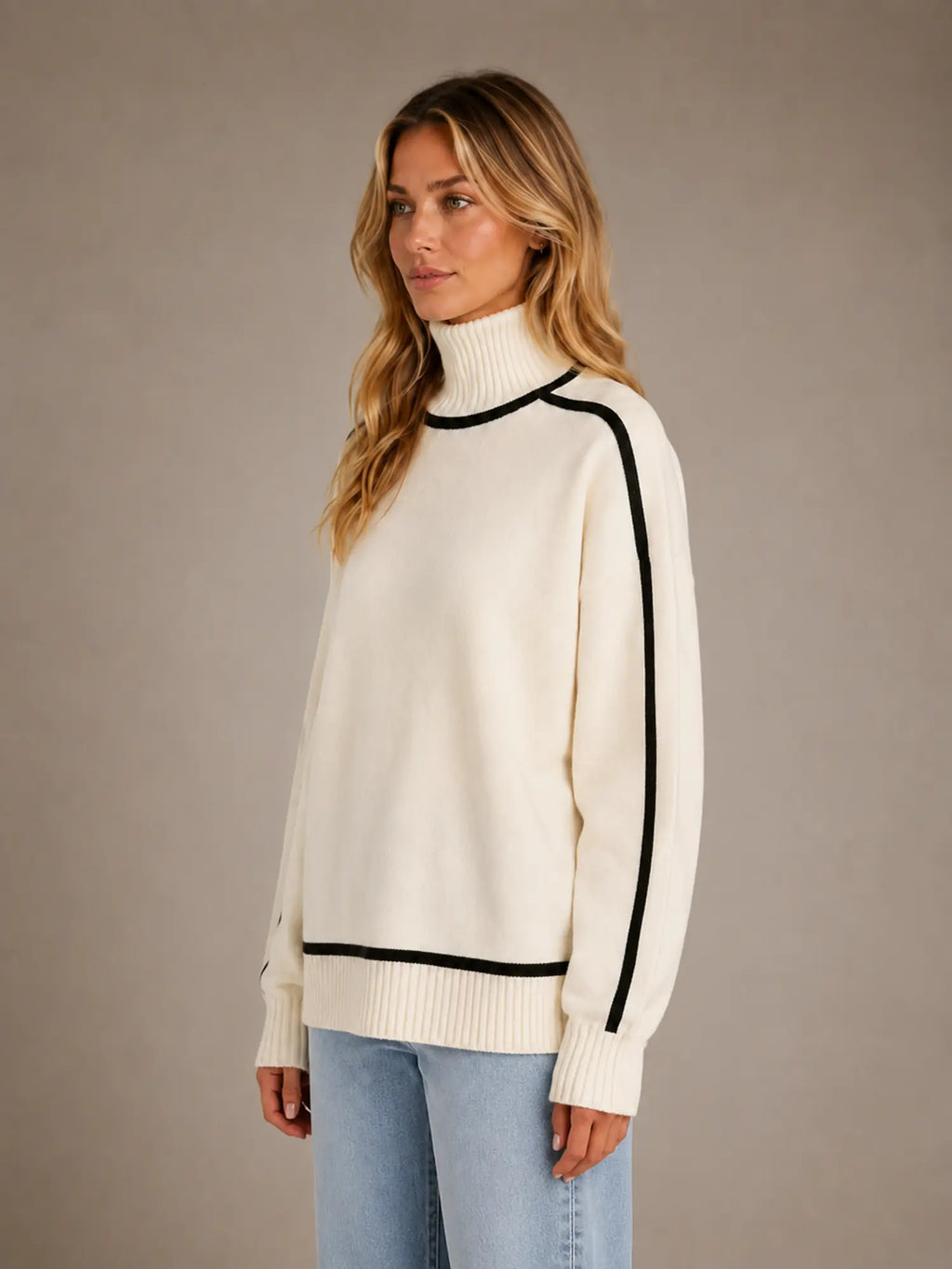 Women's Oversized Roll Neck Jumper – Soft Knit Style in Cream – Side view