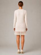 Women's Cable Knit Mini Dress – Pleated Hem Long Sleeve in Cream – Back view