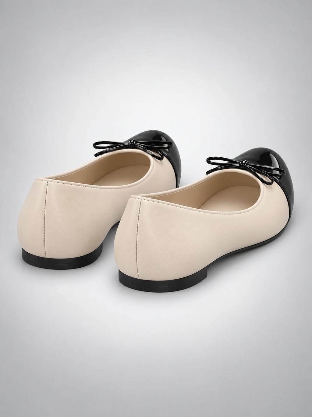 Women's Cap-Toe Ballet Flats – Bow Detail in Beige — back view