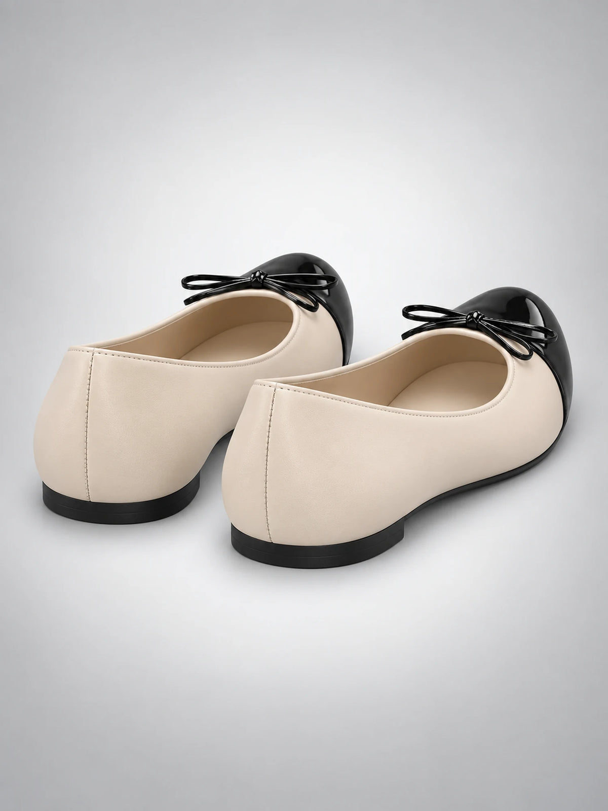 Women's Cap-Toe Ballet Flats – Bow Detail in Beige — back view