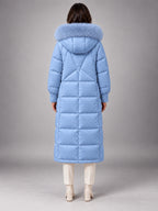 Women's Long Puffer Coat – Fur Hood Silver Clasp in Light Blue — back view