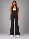 Women's Waterproof Ski Salopettes – Padded Bib Trousers in Black — front view