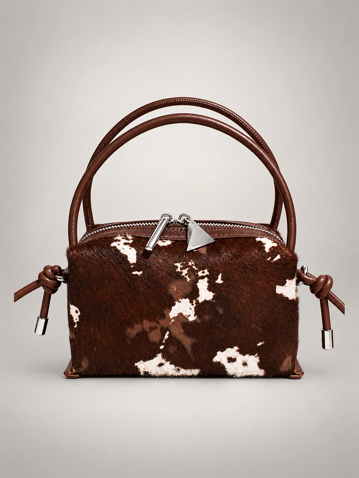 Women's Animal Print Leather Handbag – Top Handle Pillow Bag in Cowhide Brown — front view